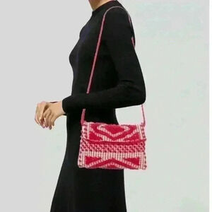 Antonello Red and White Clutch. Comes with red strap.